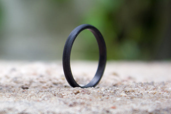 Women's carbon fiber round ring. Unique and industrial black wedding band. (00144) - Rosler Rings