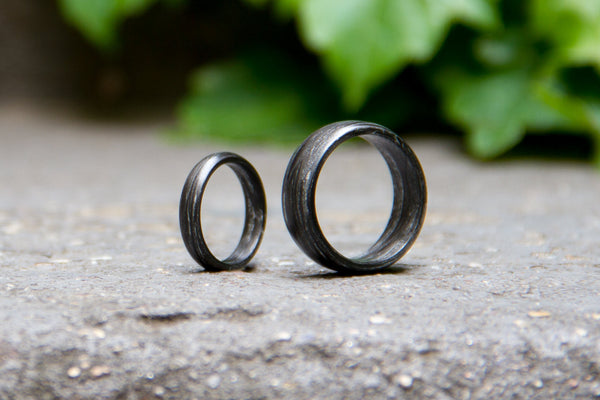 Set of two carbon fiber and silver wedding bands. Unique and modern black rings. (00110) - Rosler Rings